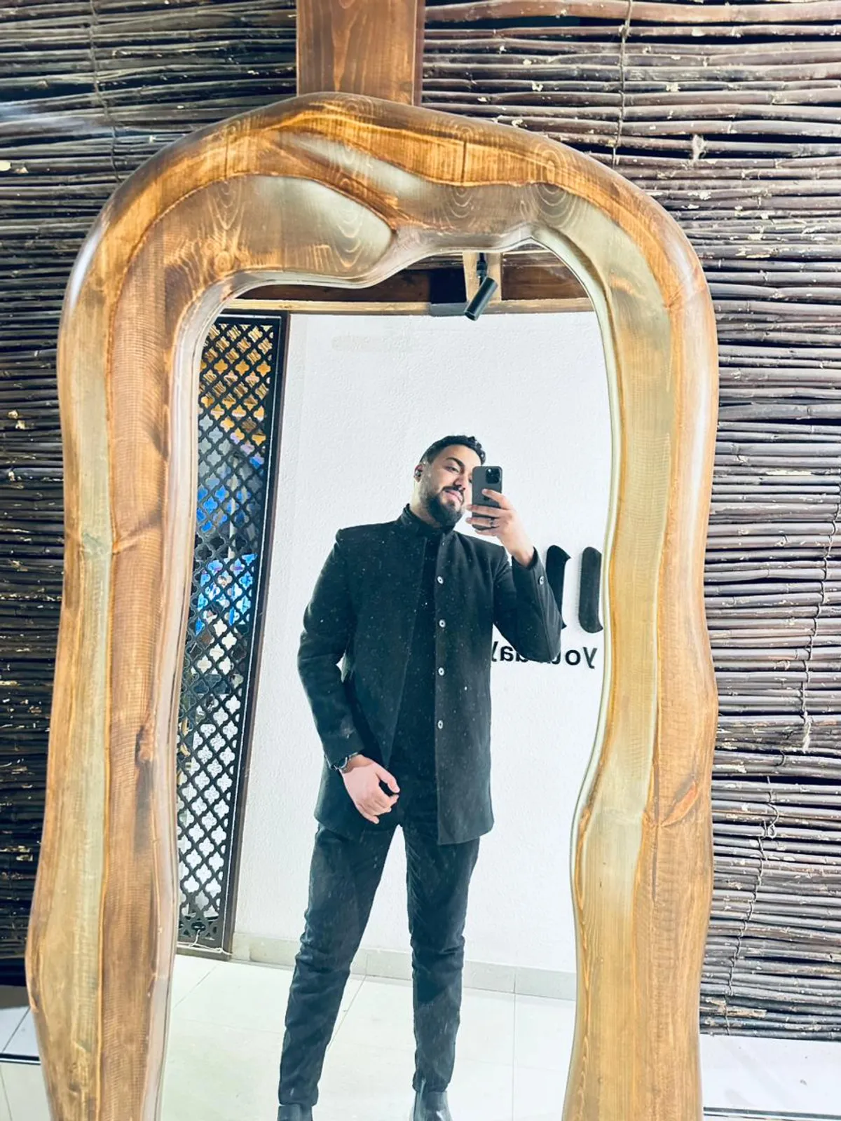 خالد نمرة — بورتريه بقميص أسود، رائد أعمال مصري ومؤسس MKFIT